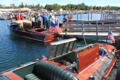 “Sugar Lady” winner Best Chris Craft 1932 27’ Chris Craft Richard & Lynette Merillet Lake Charlevoix, Michigan, “Hornet” foreground