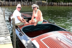 Todd-and-Beth-at-dock-–-no-hoist-first-year;-moored-in-Au-Gres-River.
